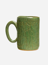 WHITE SQUIRREL CLAYWORKS: ABOMINABLE SNOWMAN GREEN 16 OZ MUG