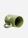 WHITE SQUIRREL CLAYWORKS: ABOMINABLE SNOWMAN GREEN 16 OZ MUG