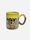 WHITE SQUIRREL CLAYWORKS: WHITE FLOWER WITH YELLOW DIP 12 OZ MUG